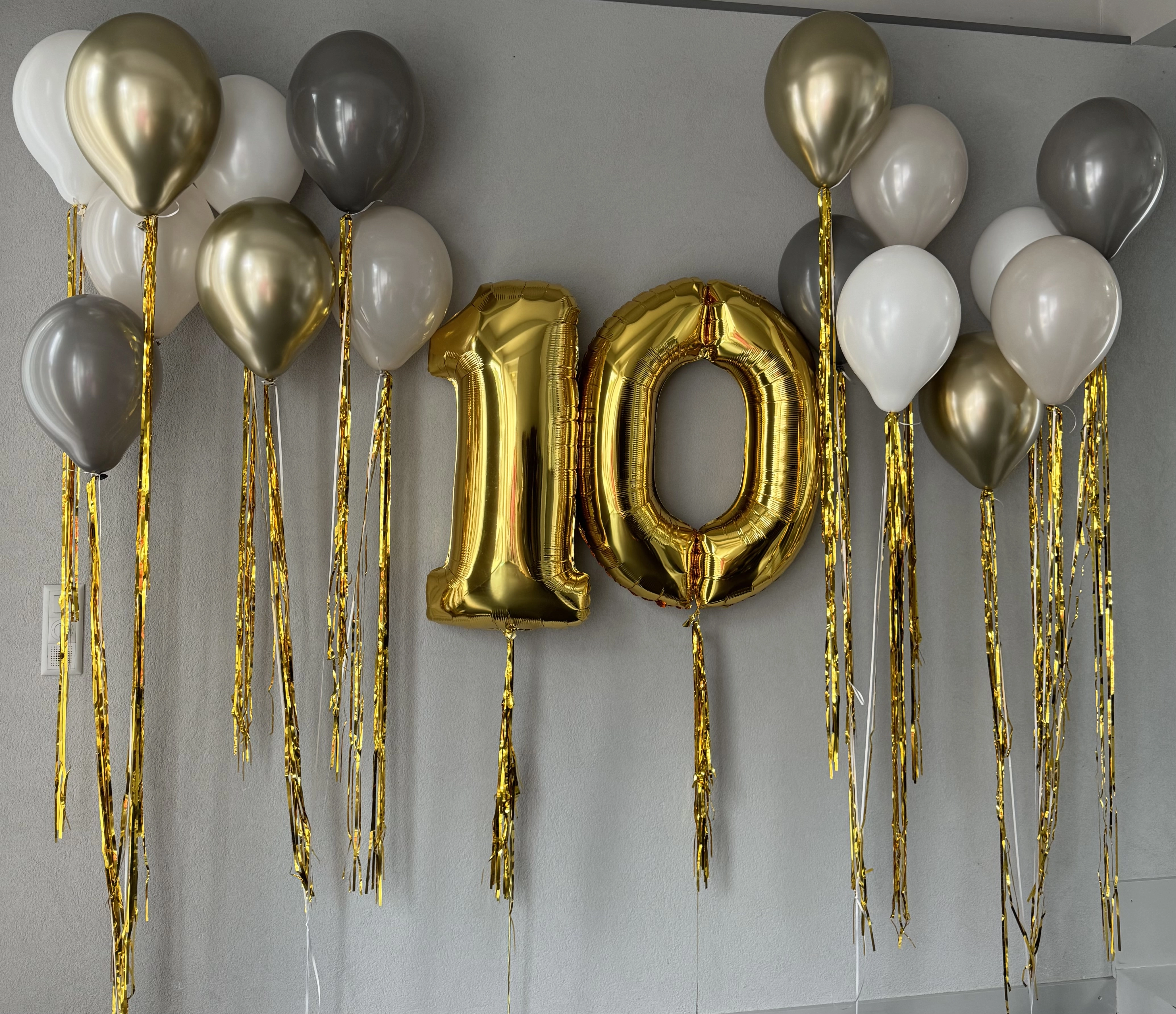 Number set surrounded by tassel balloons - “Philippe”